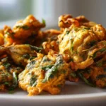Délicieux pakoras de légumes préparés au airfryer, croustillants et savoureux.
