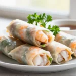 Nems au porc et crevettes croustillants en Airfryer, savoureux et dorés.